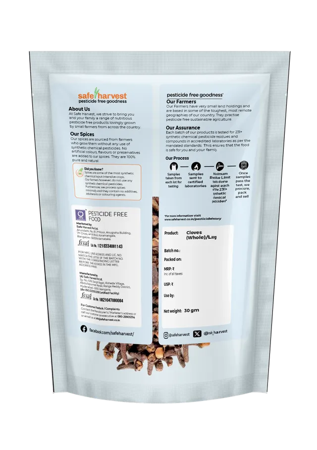 Close-Up of Whole Cloves on Wooden Spoon