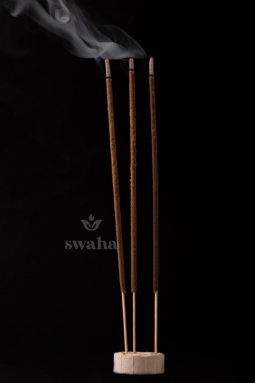 Close-up of Swaha Incense Sticks and Fragrant Smoke