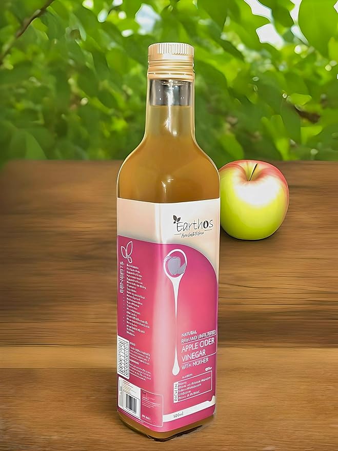 Sutrakart Earthos Vinegar Bottle with Fresh Apples Background