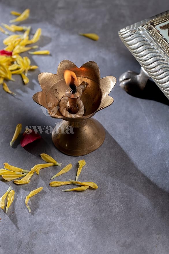Swaha Akhand Jyot Burning in Traditional Brass Diya