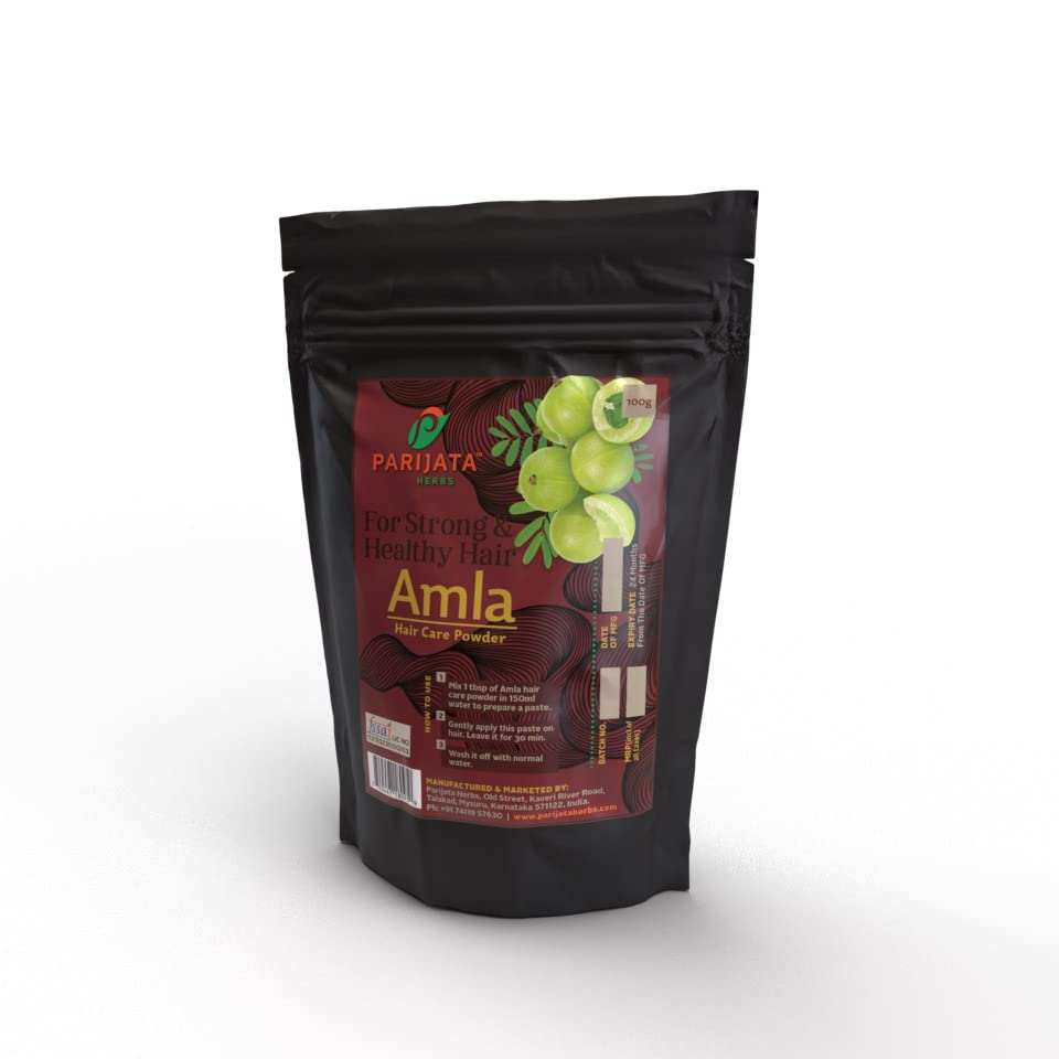Parijata Herbs Amla Powder for hair care in black packaging.