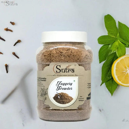 Delicious Natural Jaggery Powder jar with natural sweetener label, surrounded by herbs and