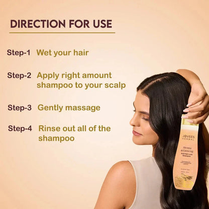 Woman applying Jovees Henna & Ginseng Anti Hair Loss Shampoo with usage directions in the background.