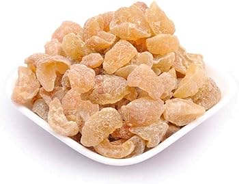 Sun-dried sweet amla pieces in a bowl