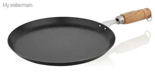 SUTRA Multi Purpose Tawa made of pure iron with a wooden handle.